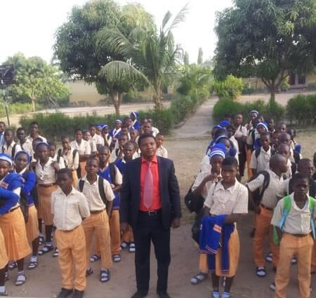 A cross section of students from Good News Secondary School with one of the staff at the assembly ground during the 2015 Tanimu Foundation award ceremony.
