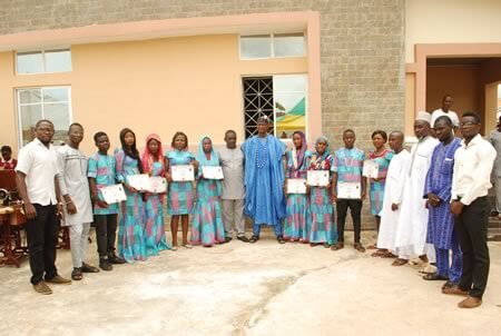 Graduates of 2017 displaying their certificate