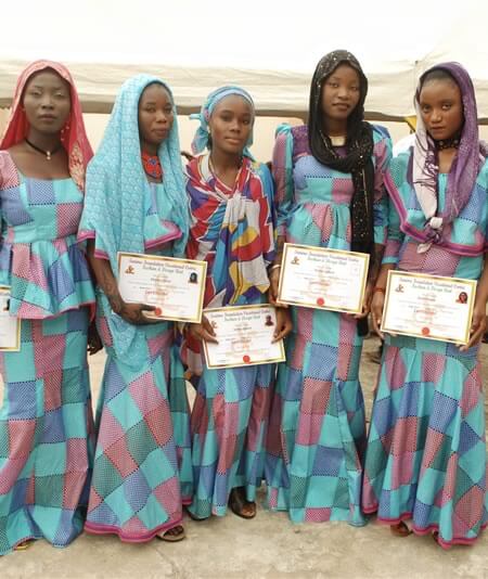 Fashion graduates model their creations